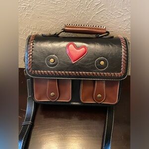 Beautiful black messenger bag with stitched heart